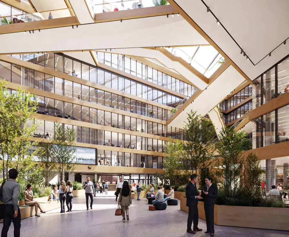 Menschen im lichtdurchfluteten Atrium von HPQ Offices